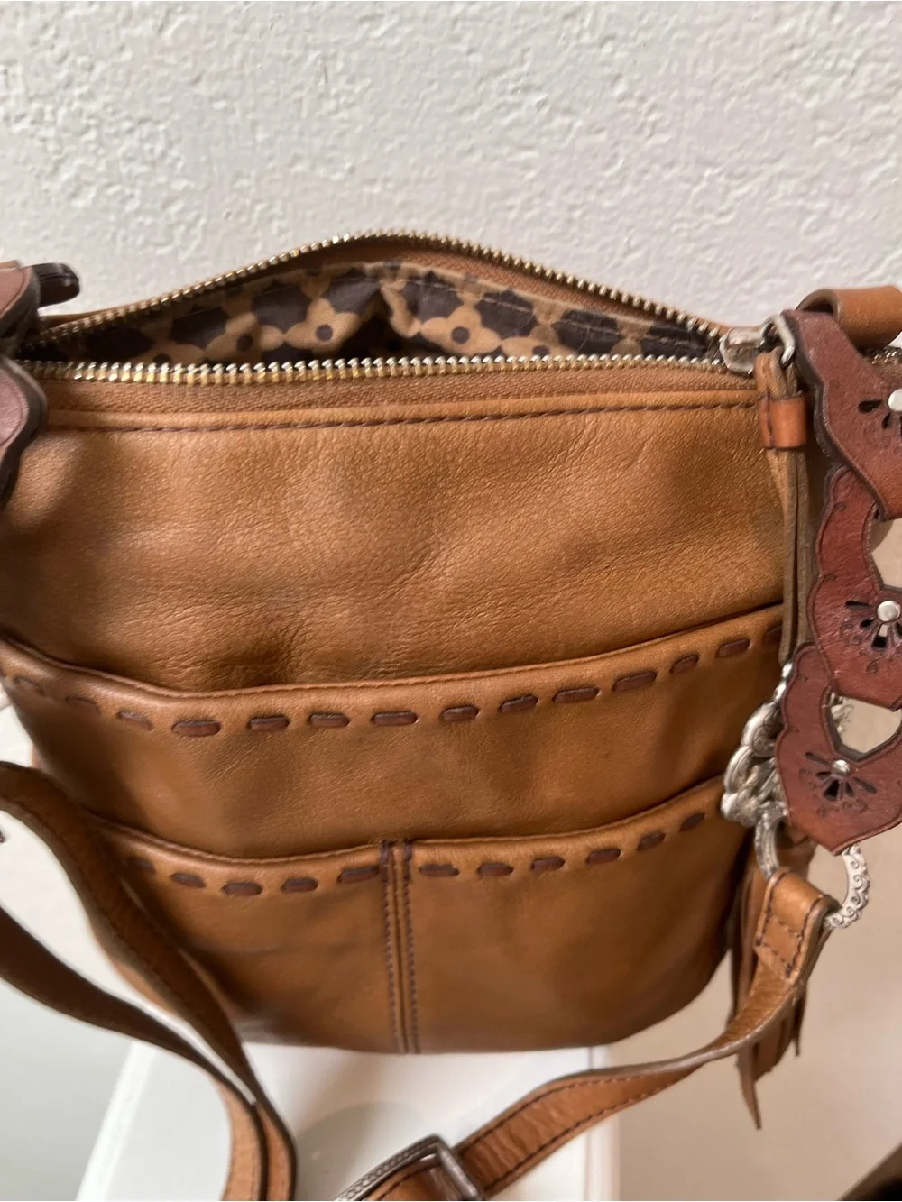 Vintage Brighton Tan Leather Crossbody Bag with Decorative Strap and Tassel